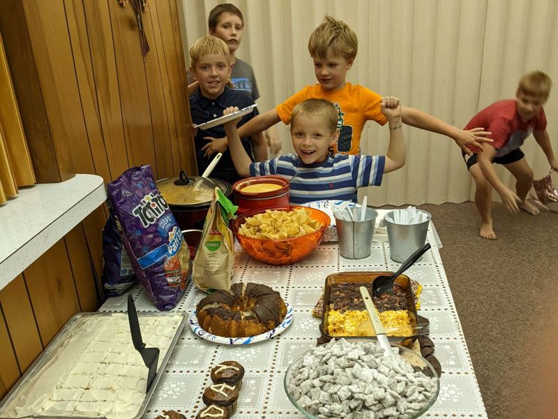 Kids lining up for a fellowship meal